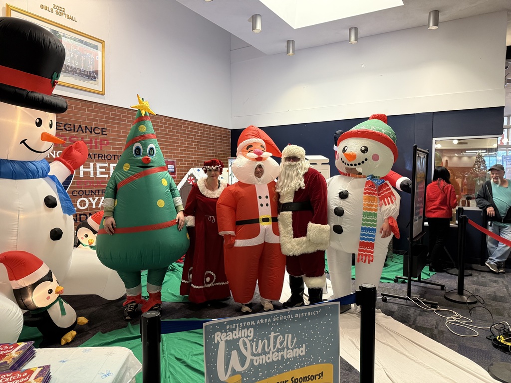 Santa with other inflatable winter characters. 