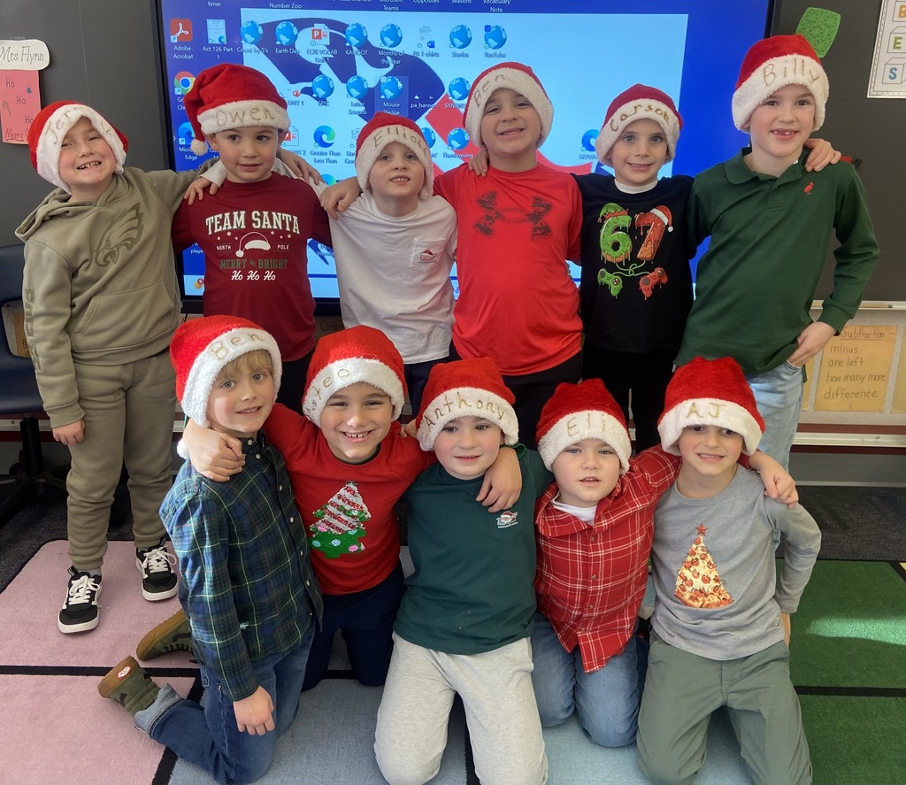 A group of students doing holiday festivities in their classroom. 
