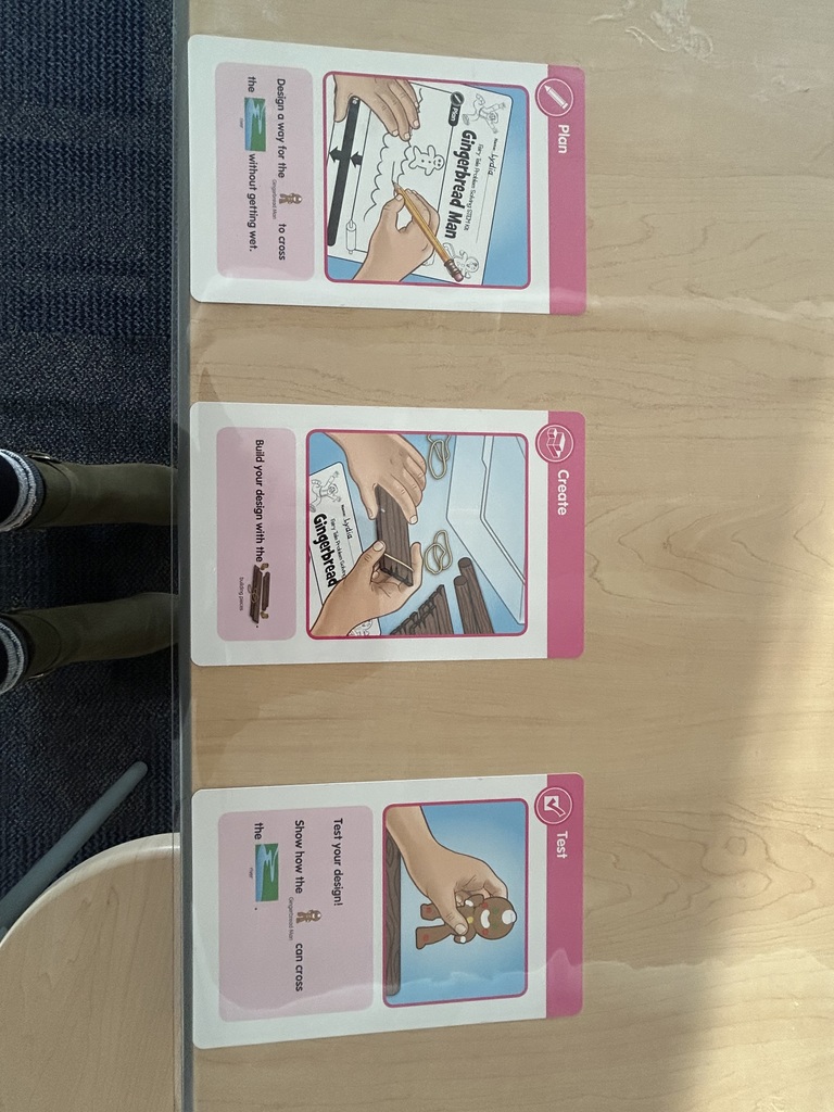 An empty stem lab showing tables with gingerbread stem activities.  