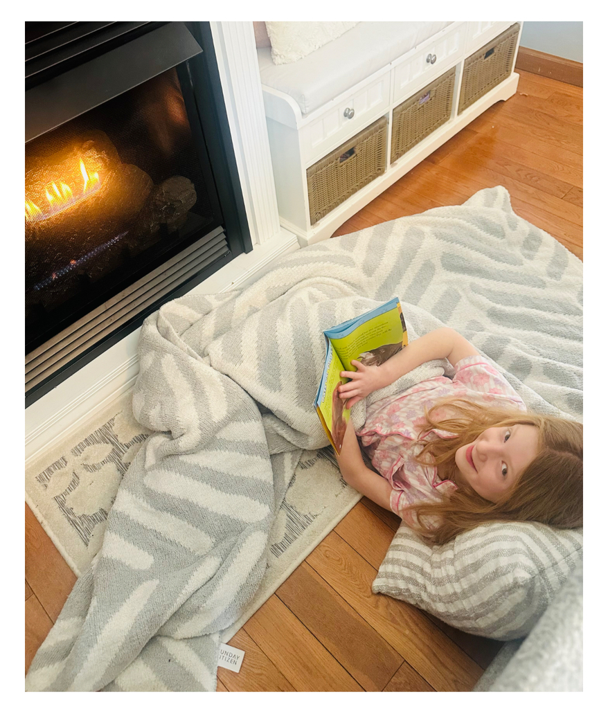 A student holding a book