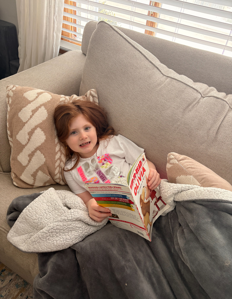 A student holding a book