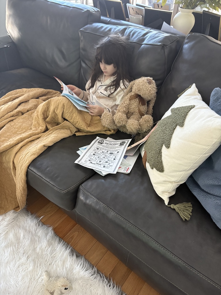 A student holding a book