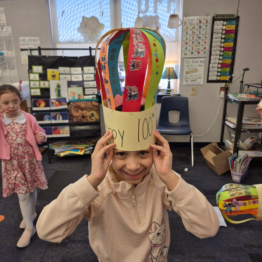 A student with 100 sticker crown .