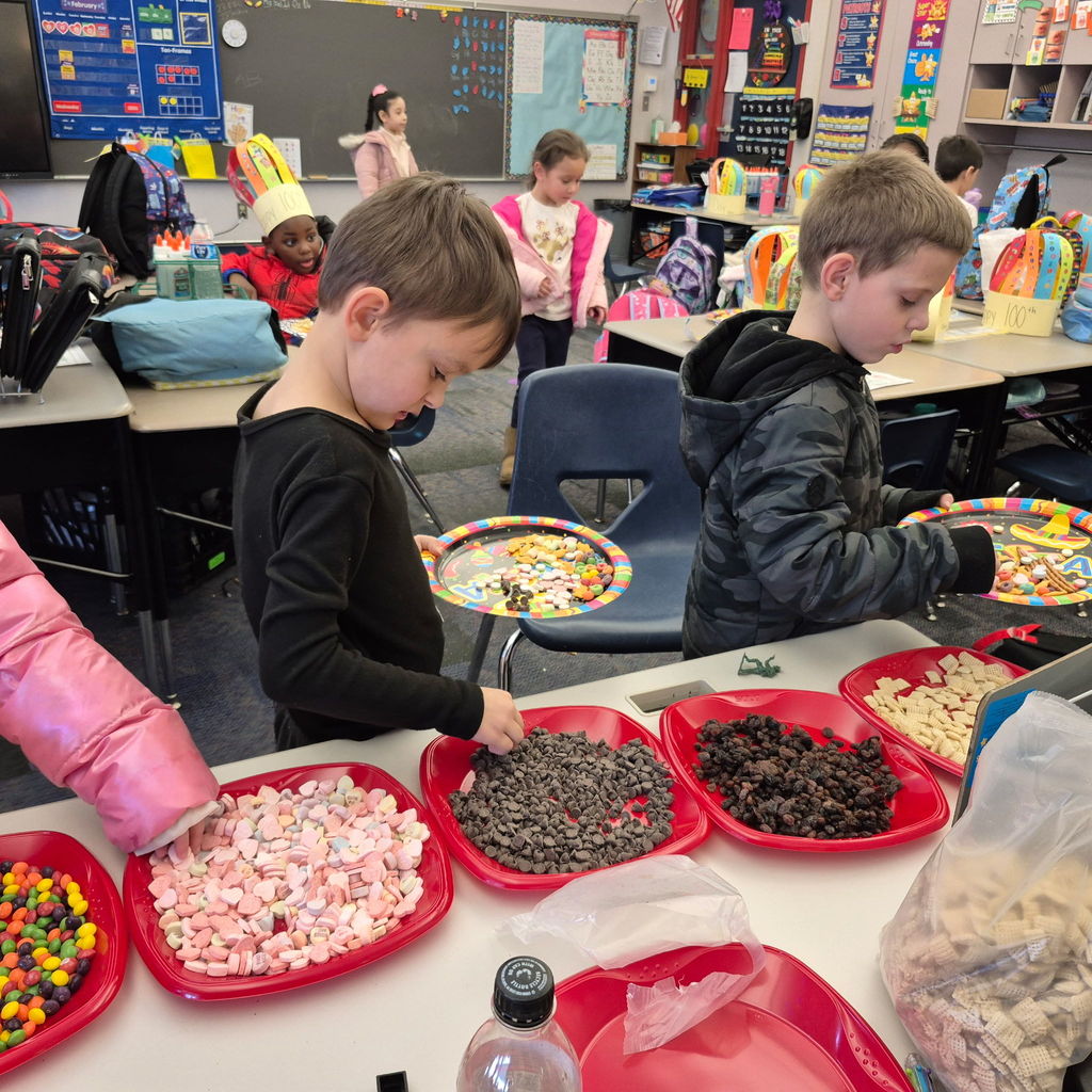 Students collecting 100 snack foods.