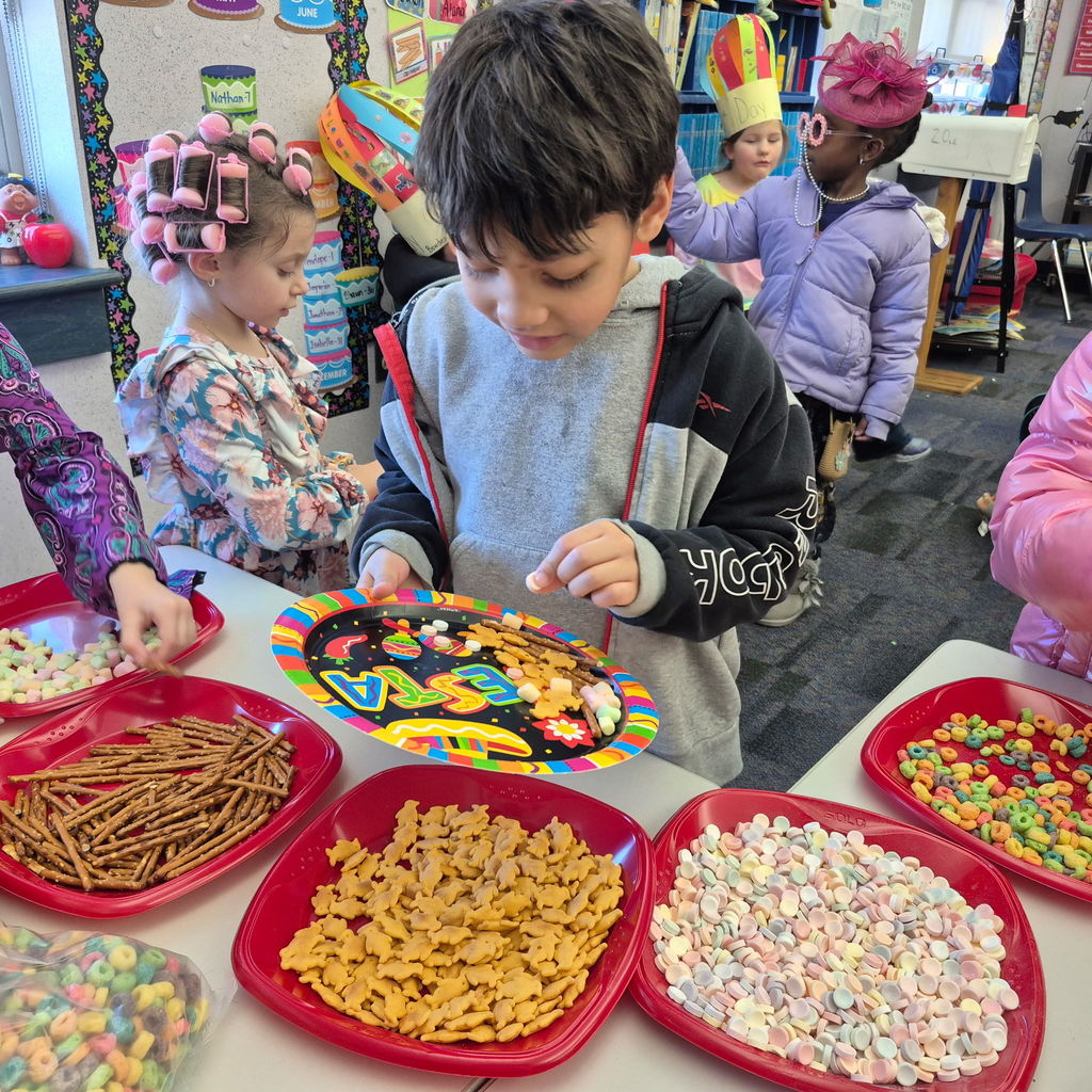 Students collecting 100 snack foods.