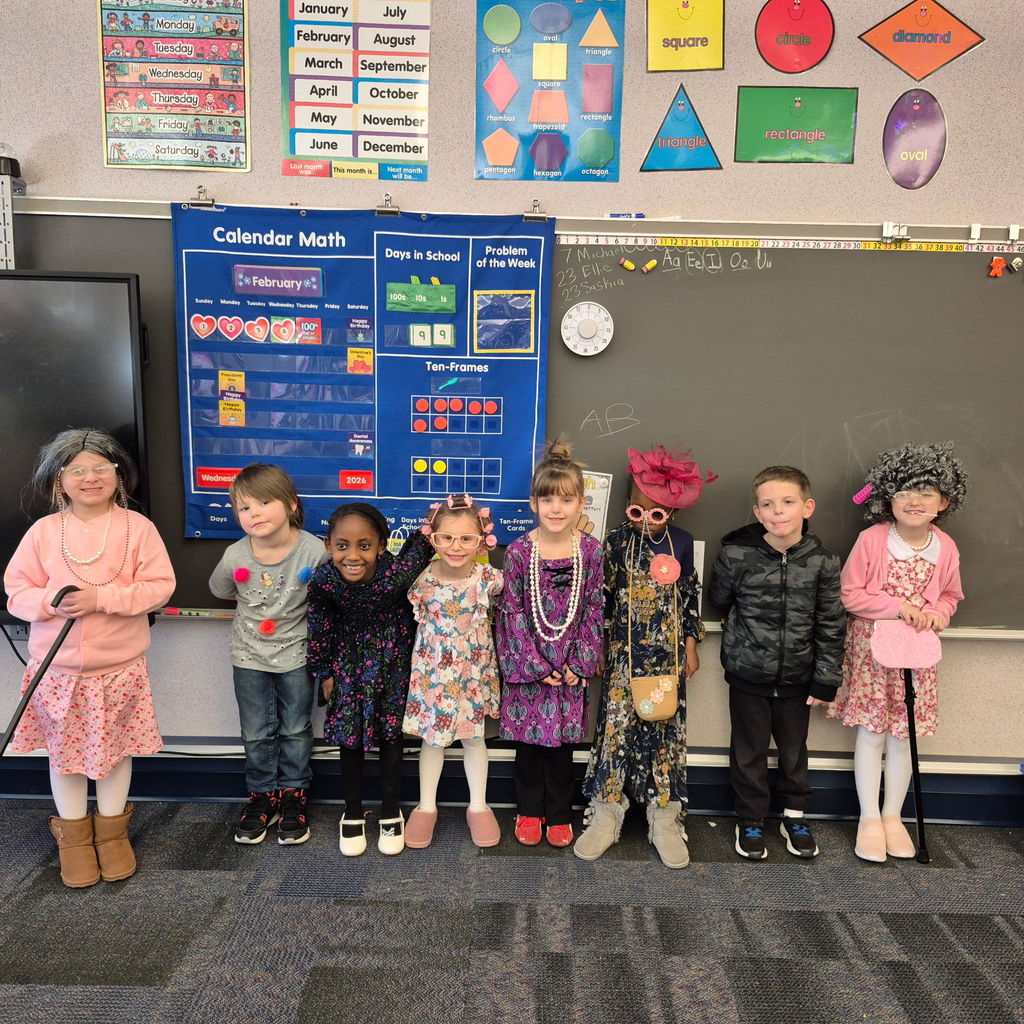 A group of kindergarten students dressed as old people.