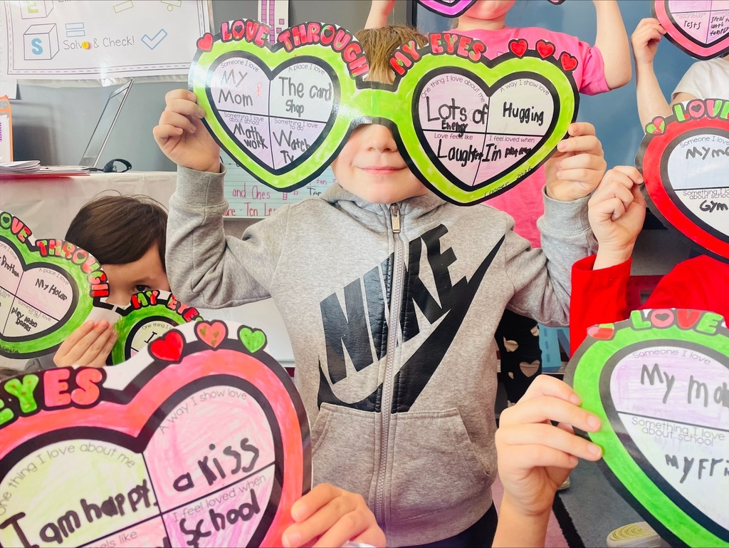 Students with valentine sunglass craft