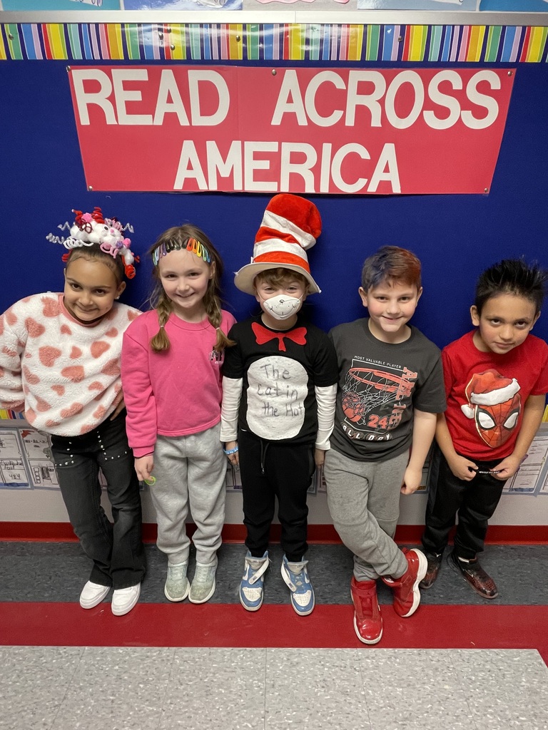 A group of students posing with silly hats