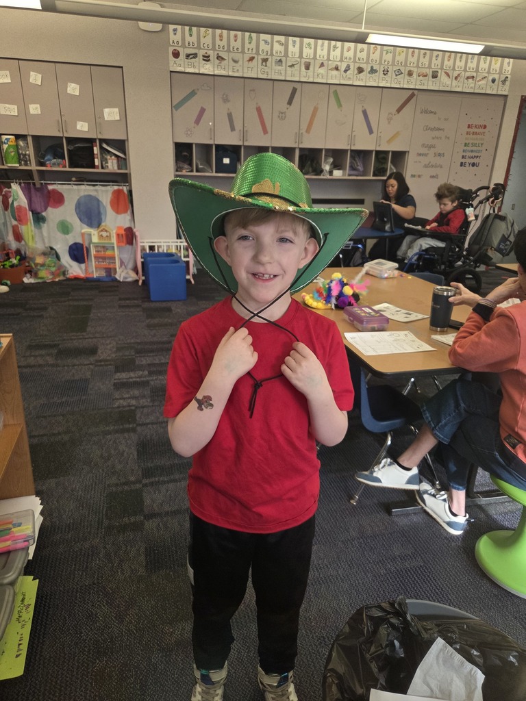 Student wearing a green hat