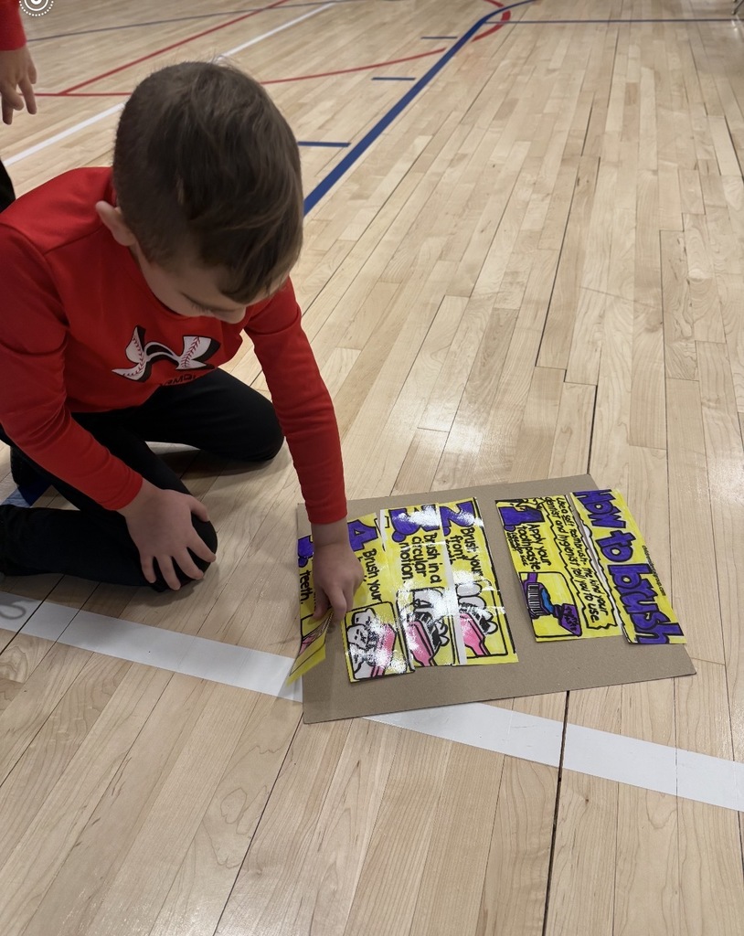 A student completing a dental health puzzle.