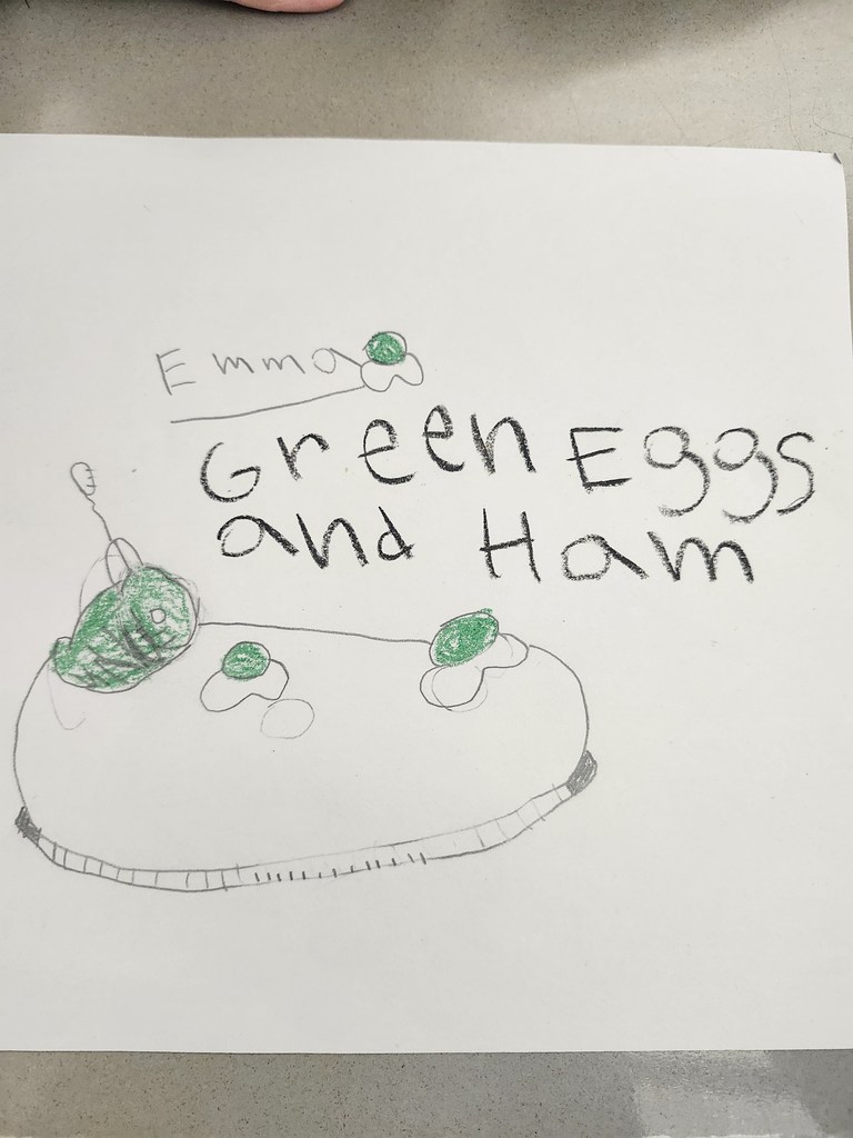 Green eggs and ham and drawing on white paper