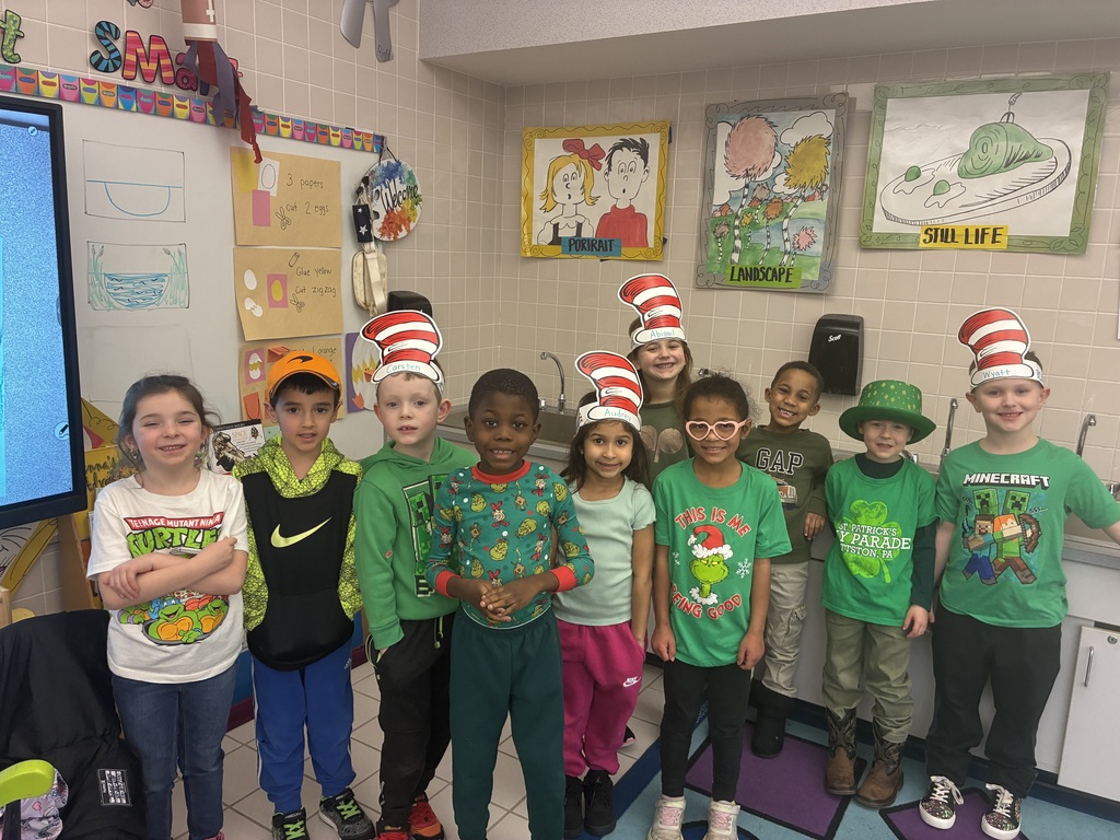 A group of students wearing green