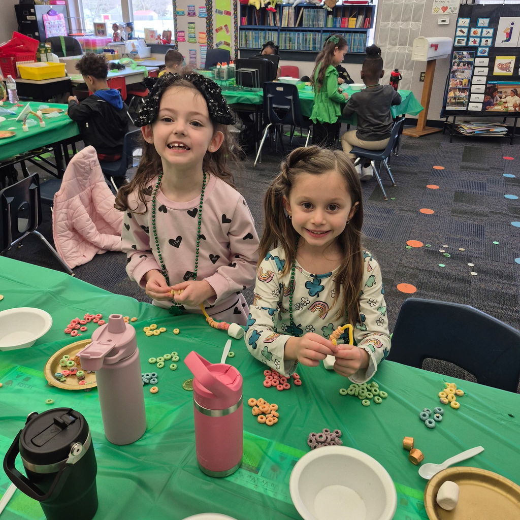 Students making a fruit loop rainbow