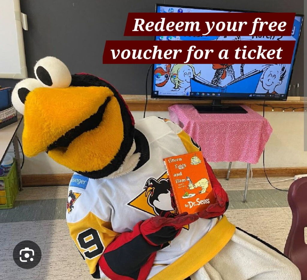 A photo of tux the penguin hockey penguin mascot holding a green eggs and ham book with text redeem your free voucher for a ticket