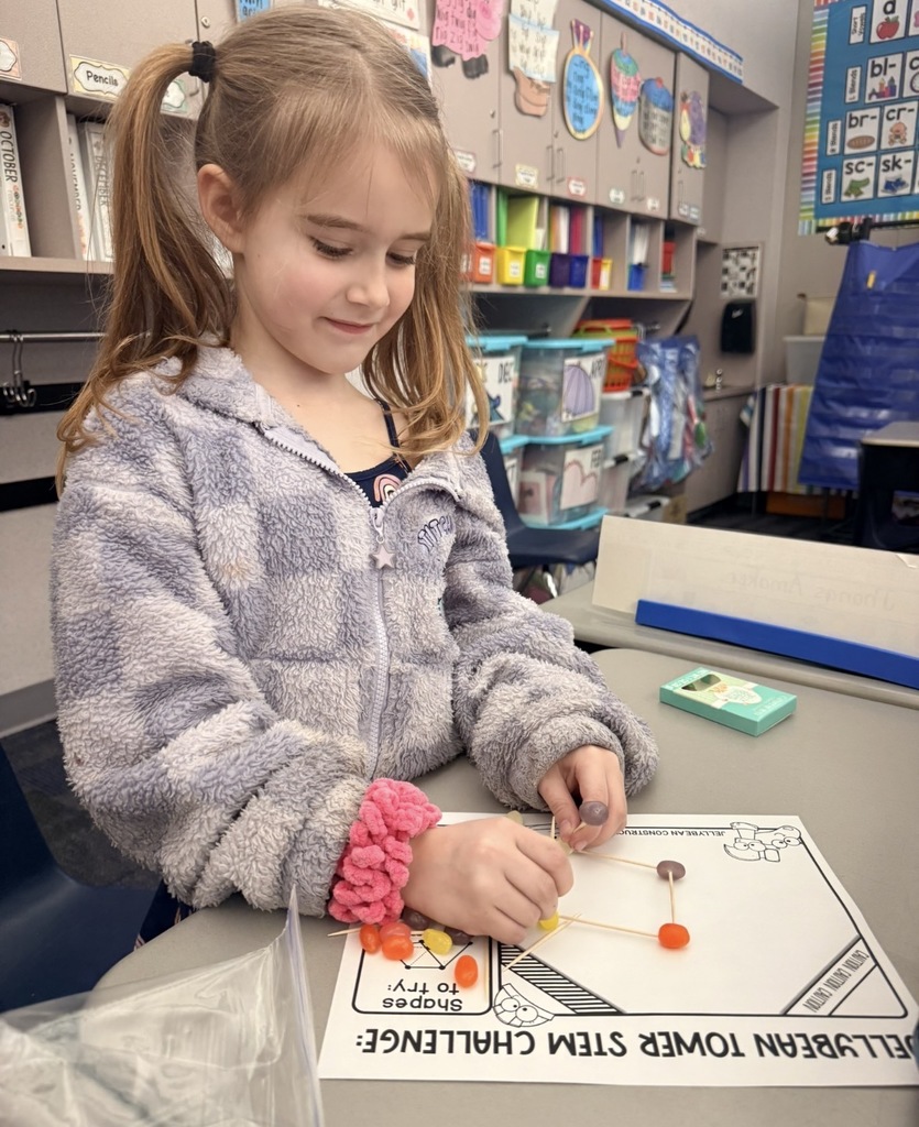 Students doing easter candy math graphs. 