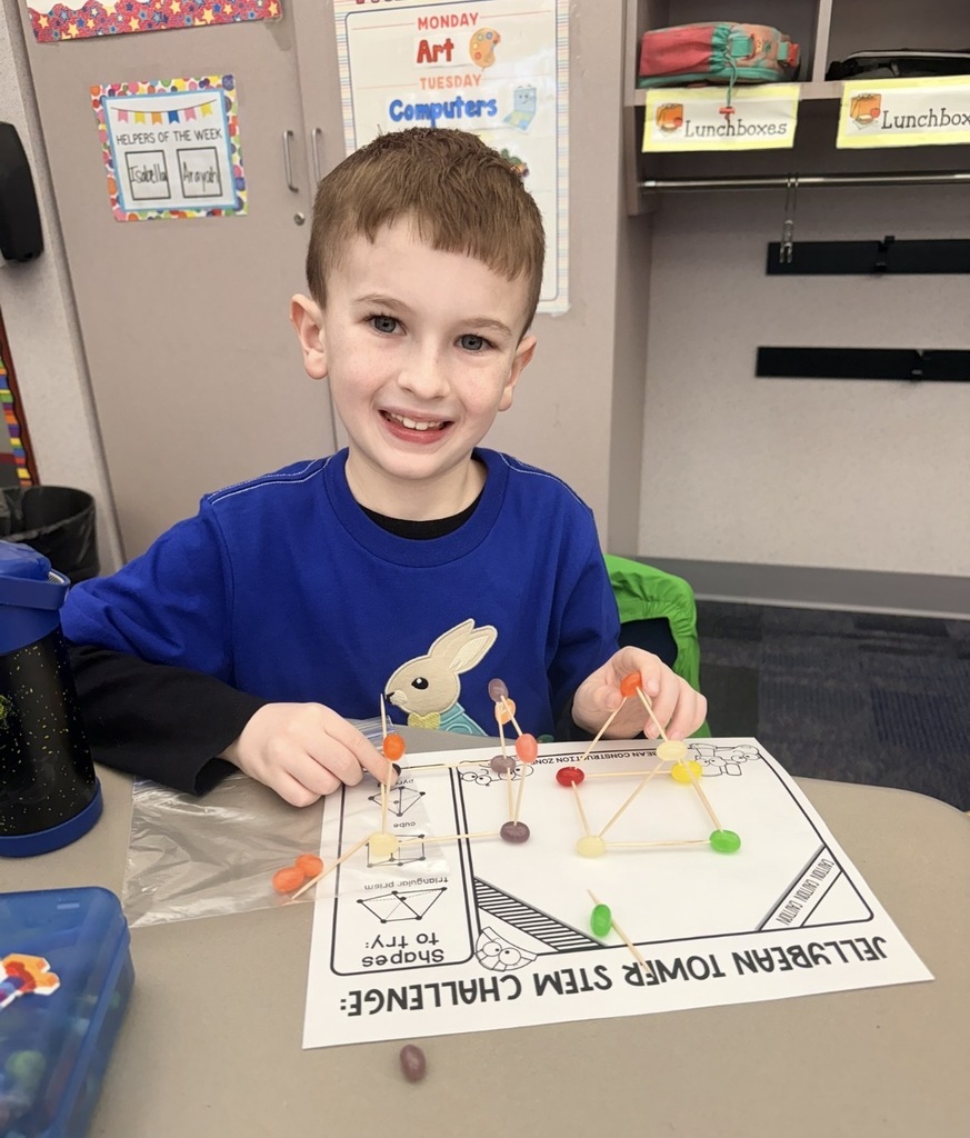 A students building jelly bean structures 