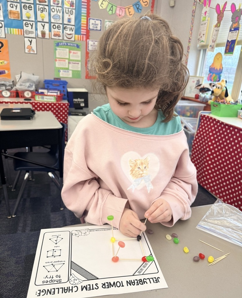 A students building jelly bean structures 