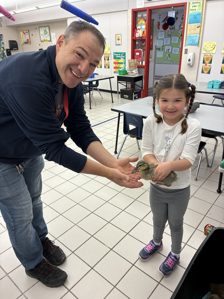Mr. Dave and lucy holding a duck