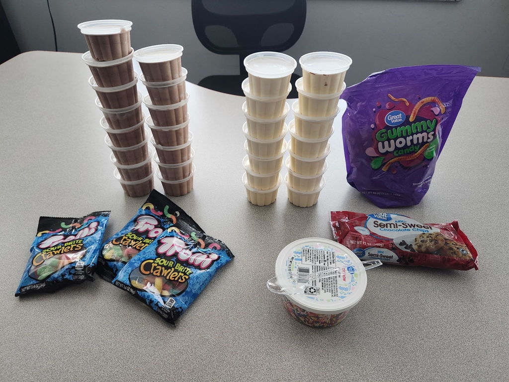 Ice cream cups and candy toppings