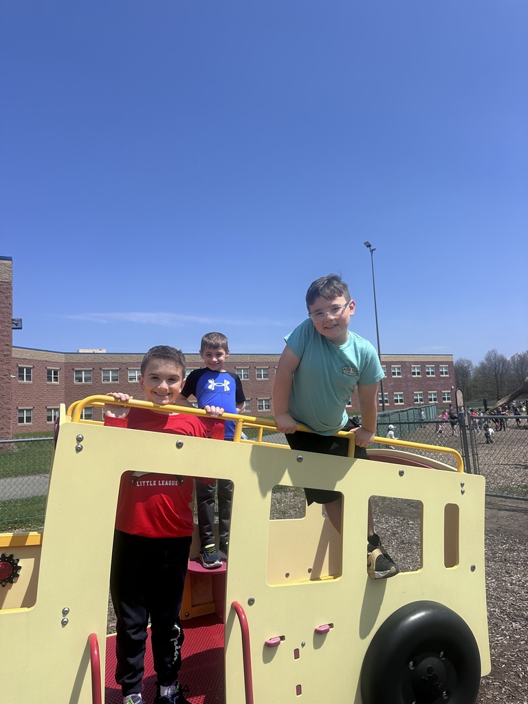 A  child working as a teacher on bring your kid to work day. 