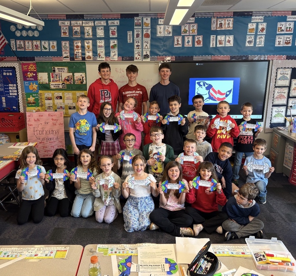 A group of high school fab readers at the primary center with Mrs. Melvin’s 2nd grade class.