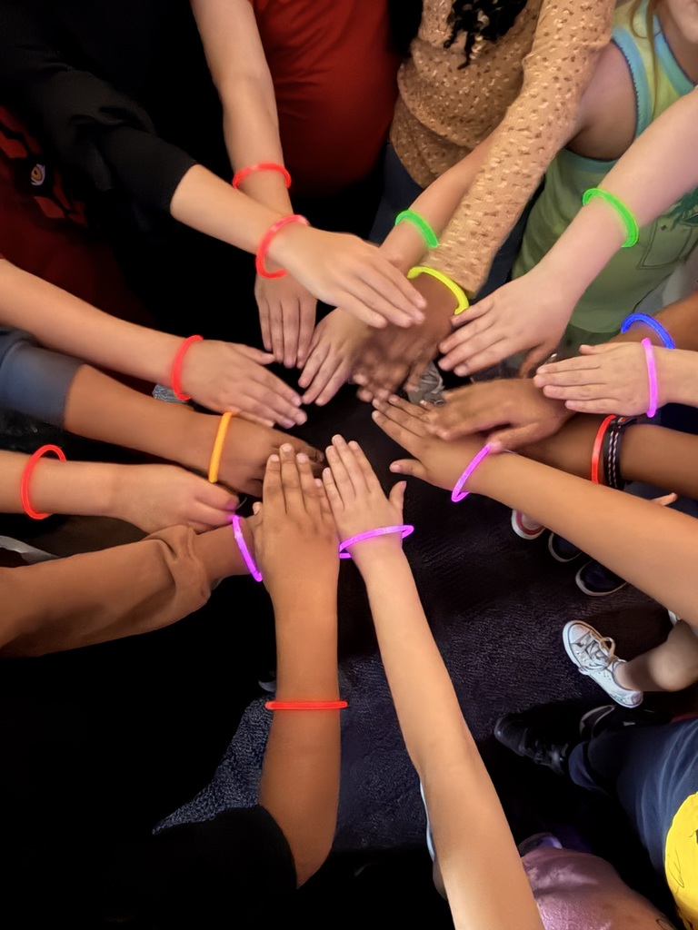 Students with glow stick bracelets 
