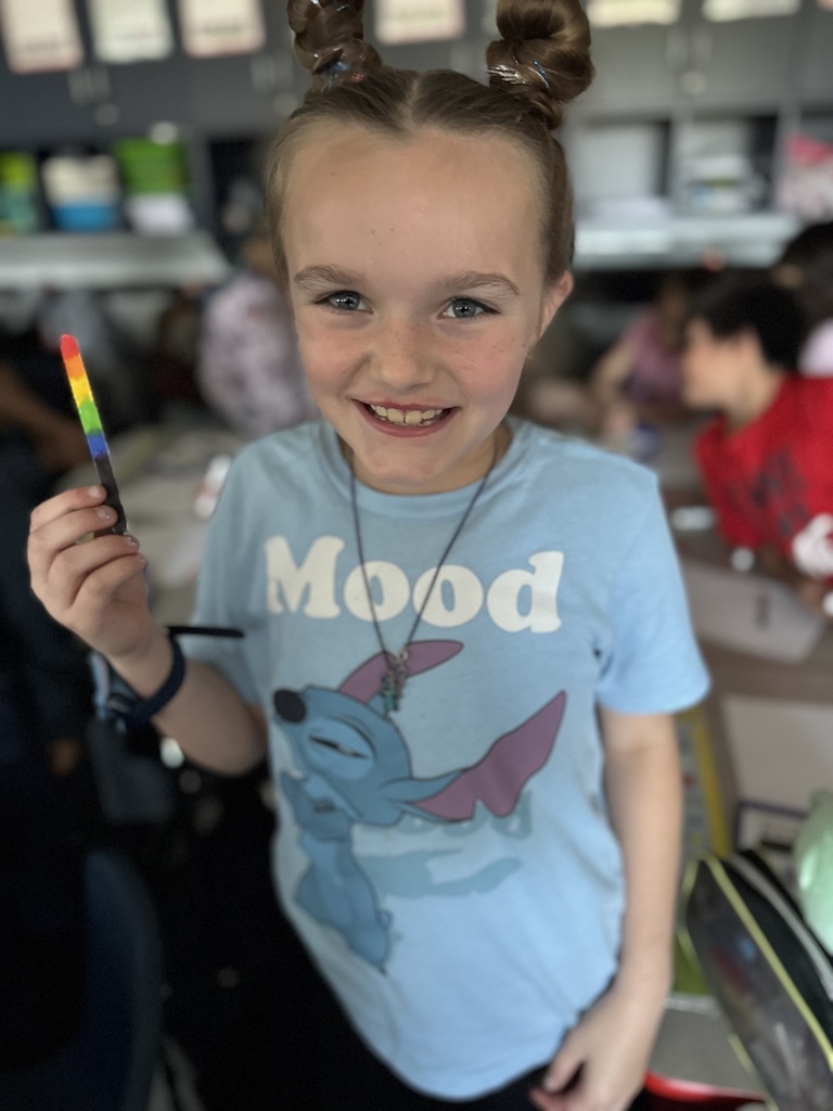 A student celebrating star wars day. 
