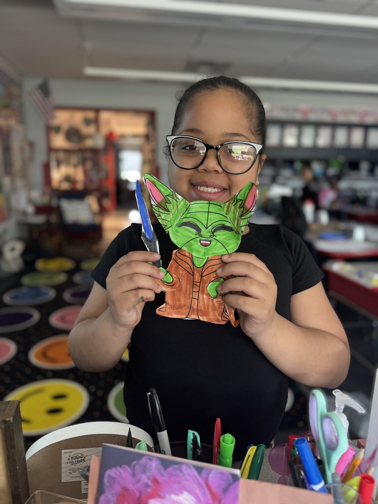 A student celebrating star wars day. 