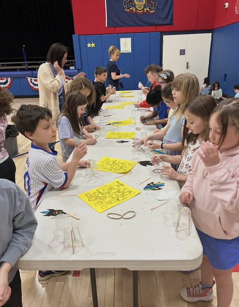 Students designing cup rockets