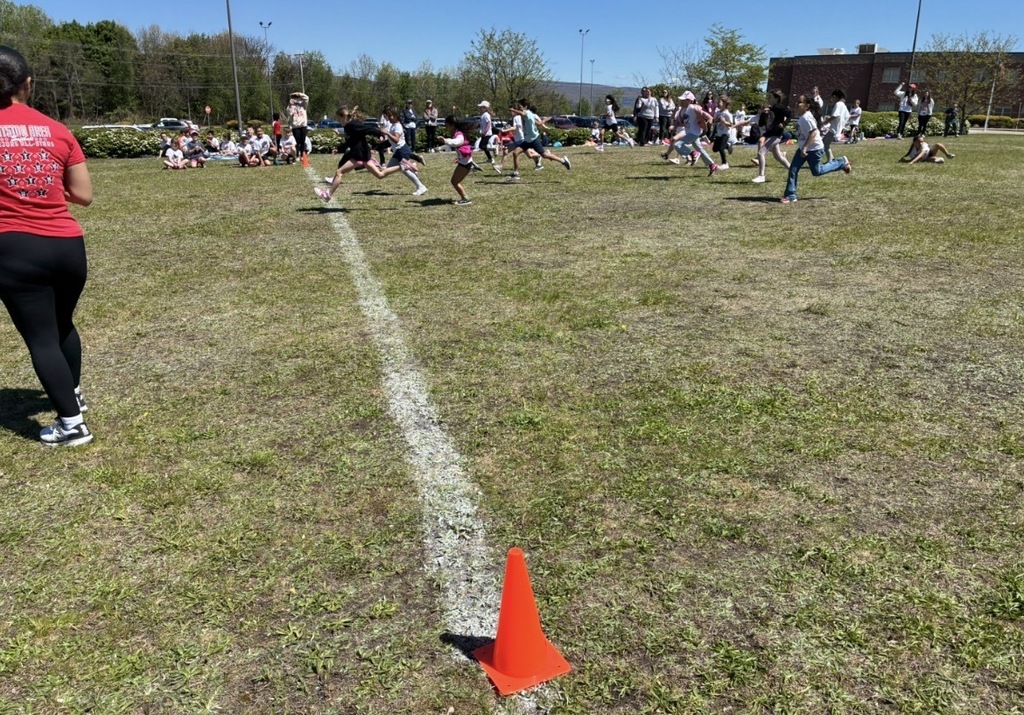 Students at field day racing. 