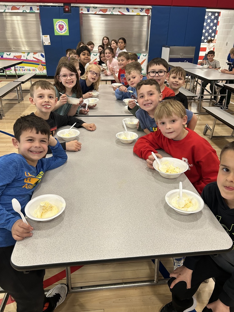 Students at an ice cream social in the cafeteria 
