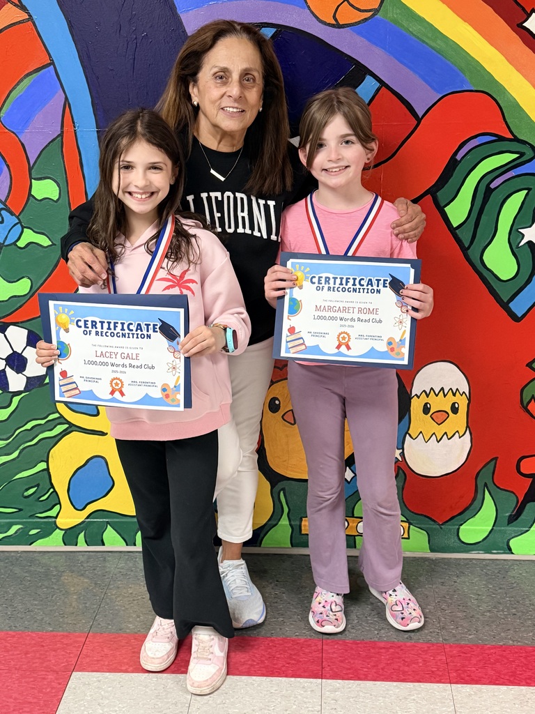 Lacey, Mrs. Rava and Maggie holding 1 million word club certificates 