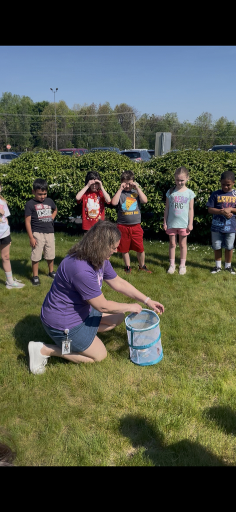 Mrs. Z’s second grade releasing butterflies. 