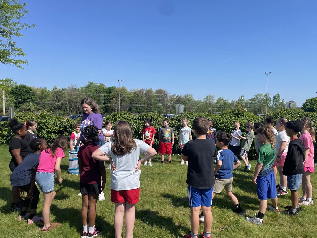 Mrs. Z’s second grade releasing butterflies. 