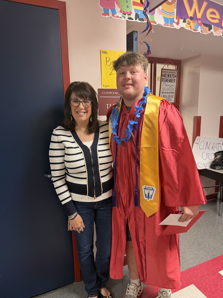 High schools students in the primary center hallways greeted by students and teachers  