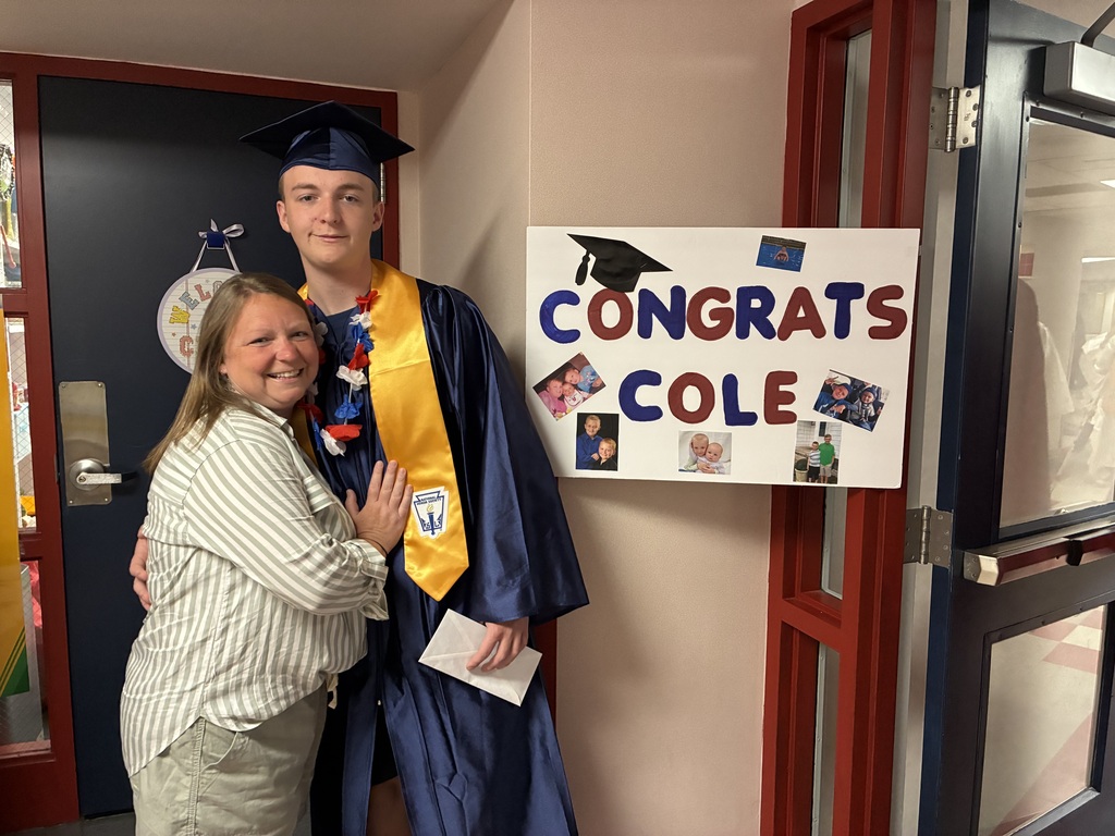 High schools students in the primary center hallways greeted by students and teachers  