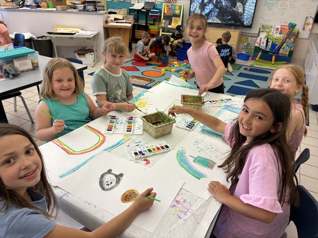 Students with their art