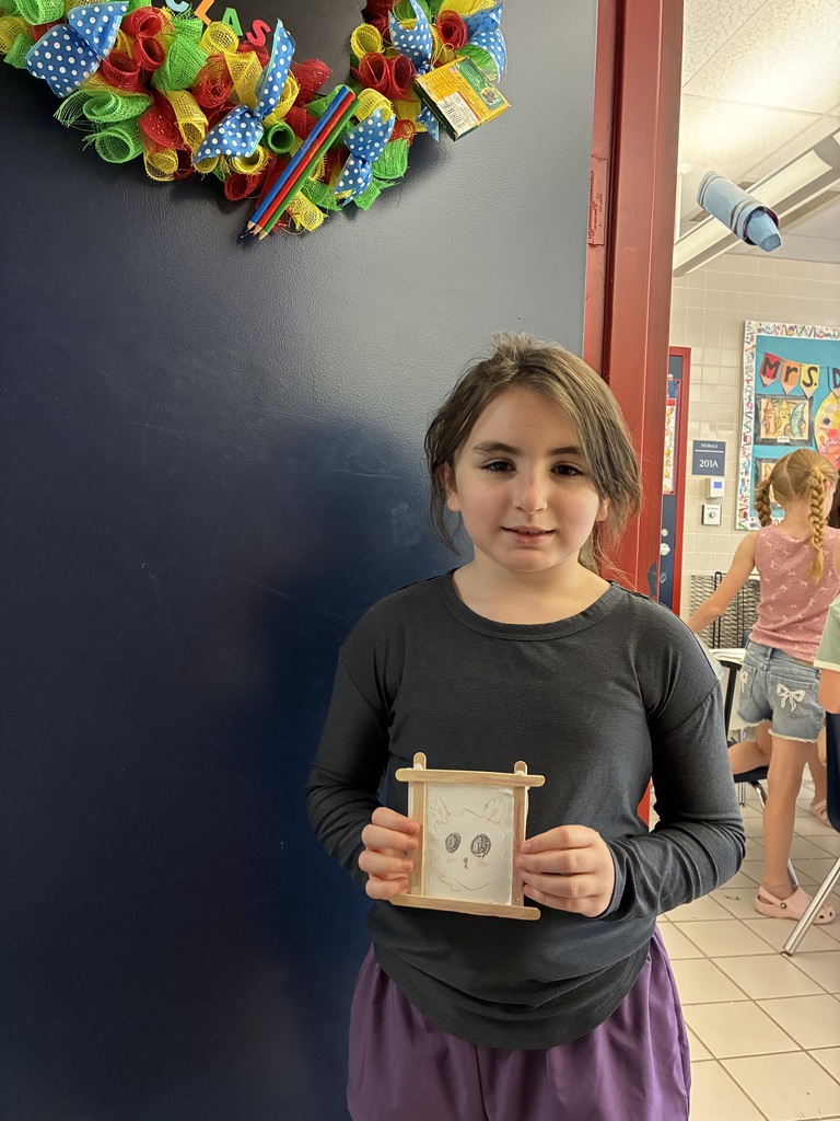 Students with their art