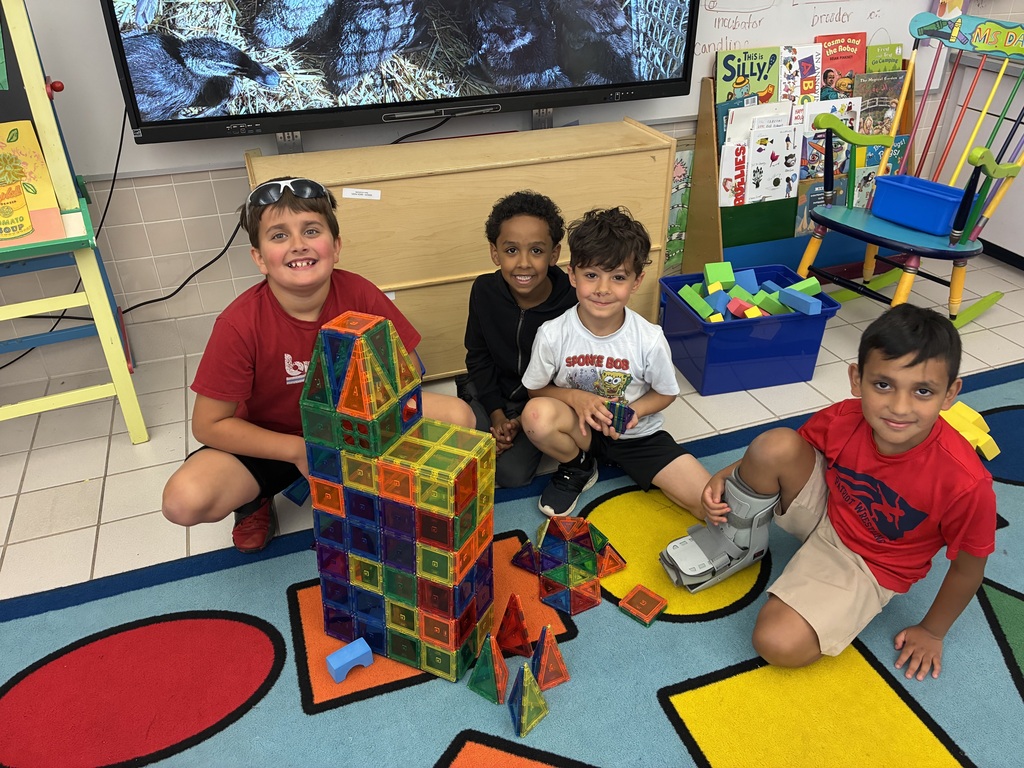 Students with their art