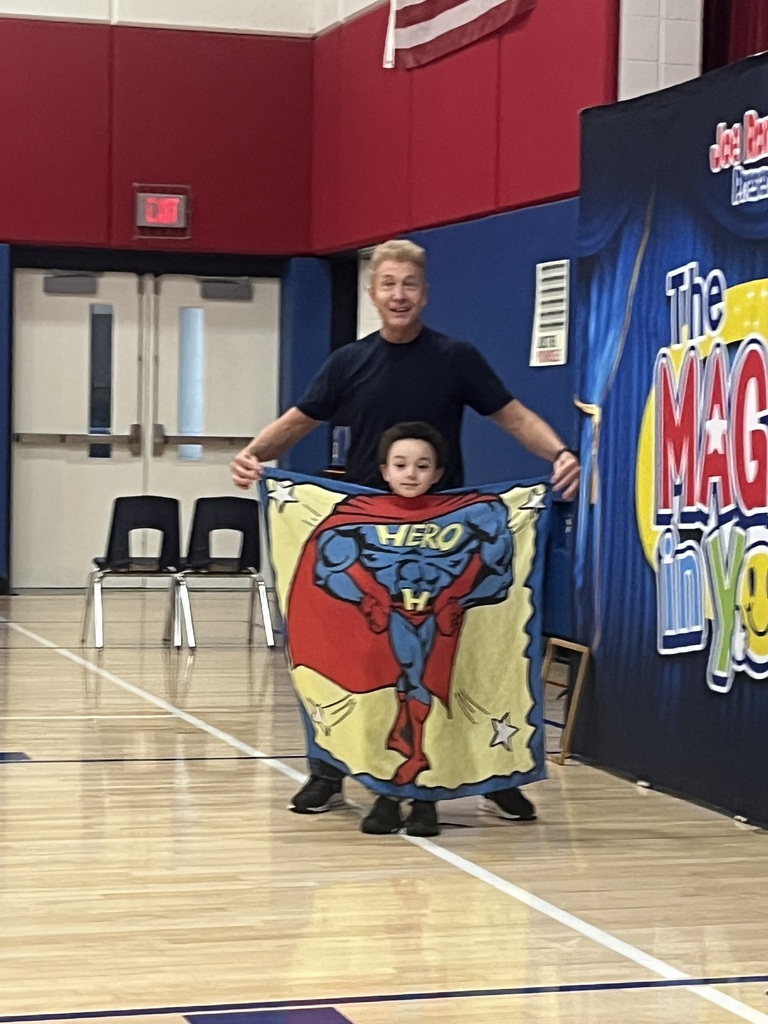 Students at a magic show assembly