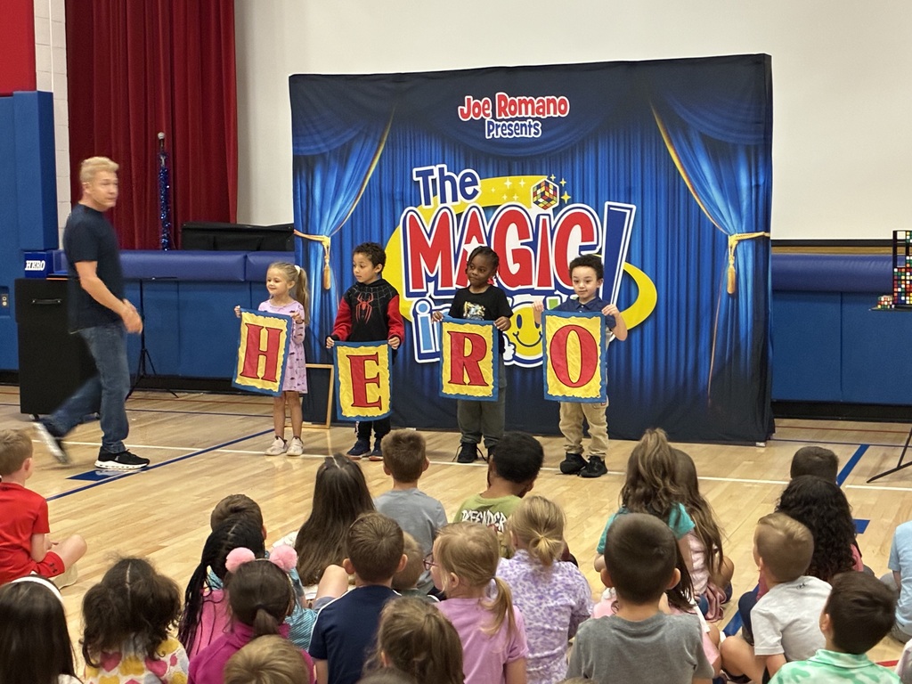 Students at a magic show assembly