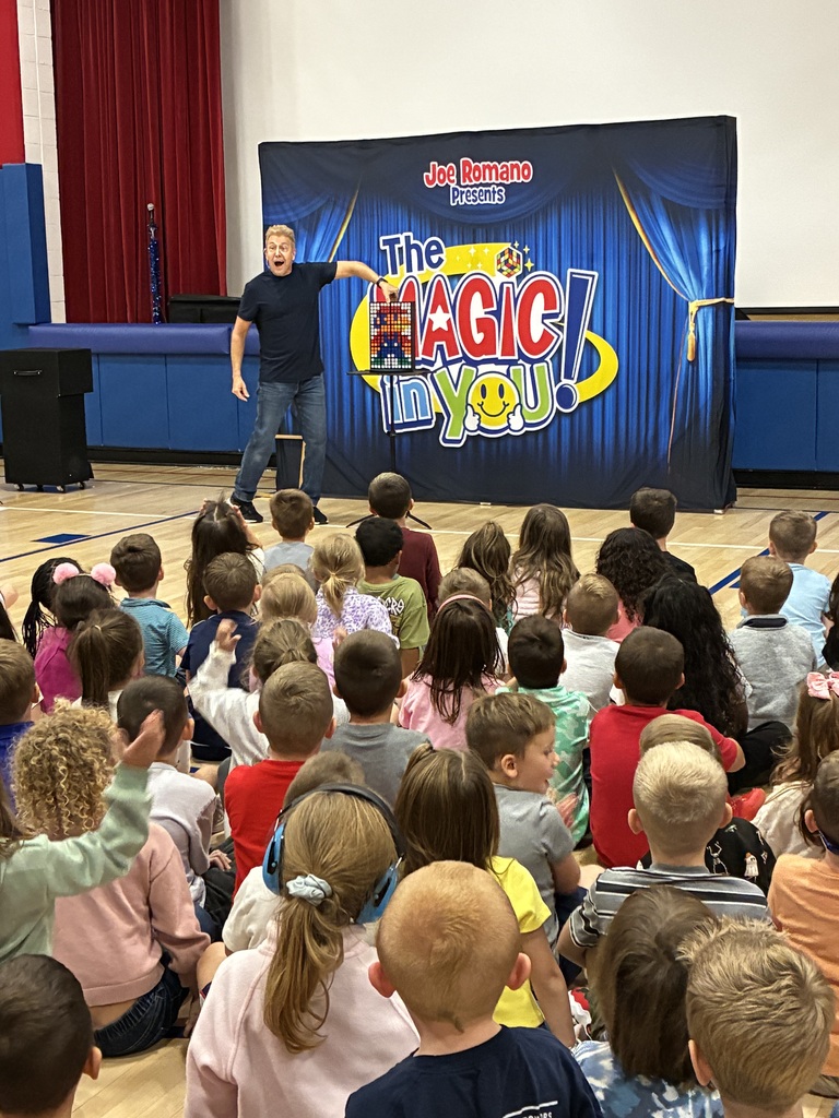 Students at a magic show assembly