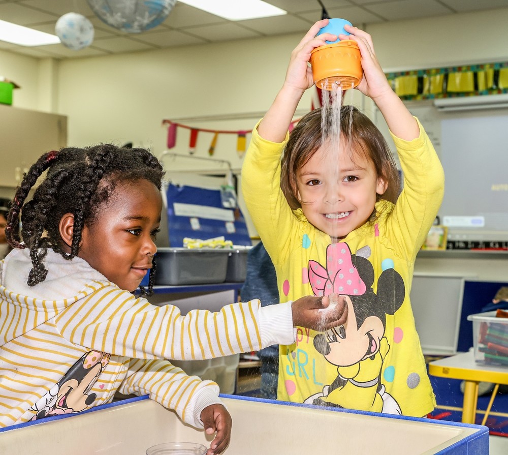 BMLC students play in sand