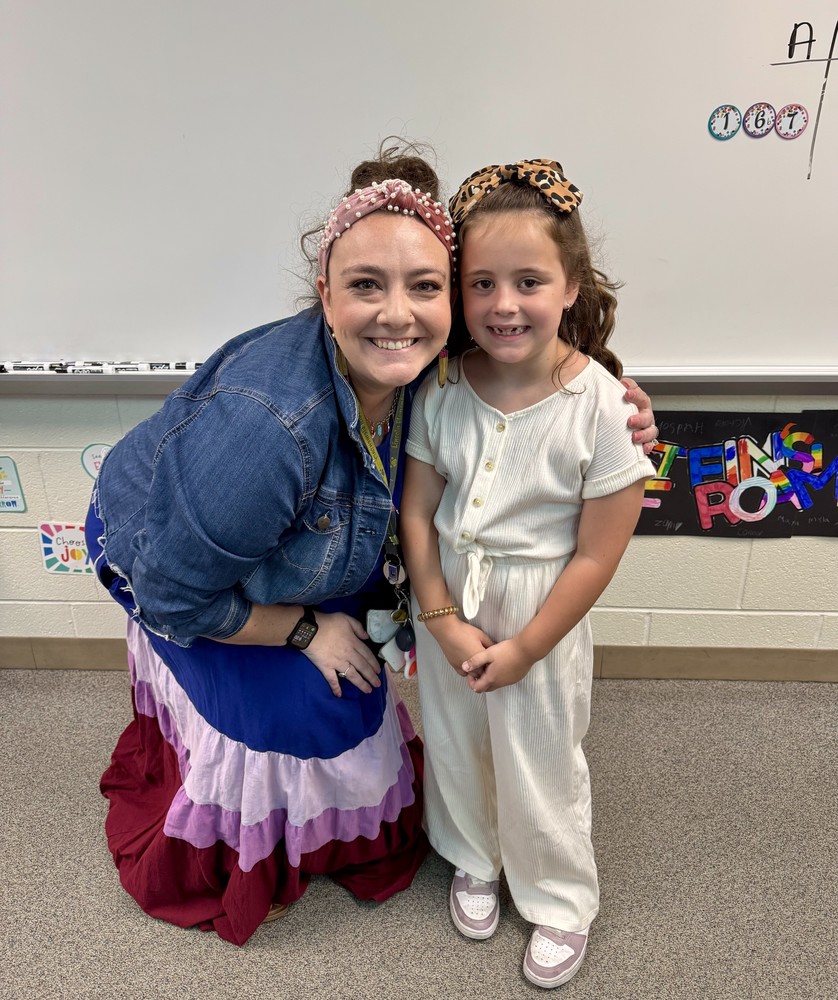 Jessica Rotstein stands with her student