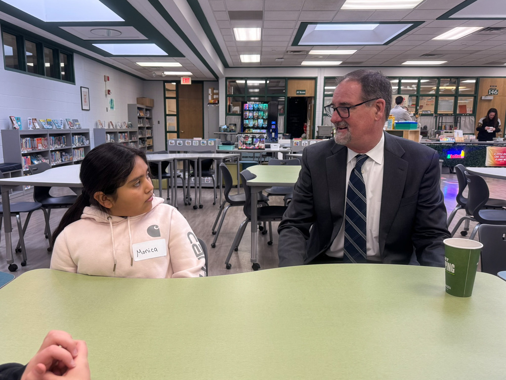 Superintendent Dr. Glenn Wood talks to student