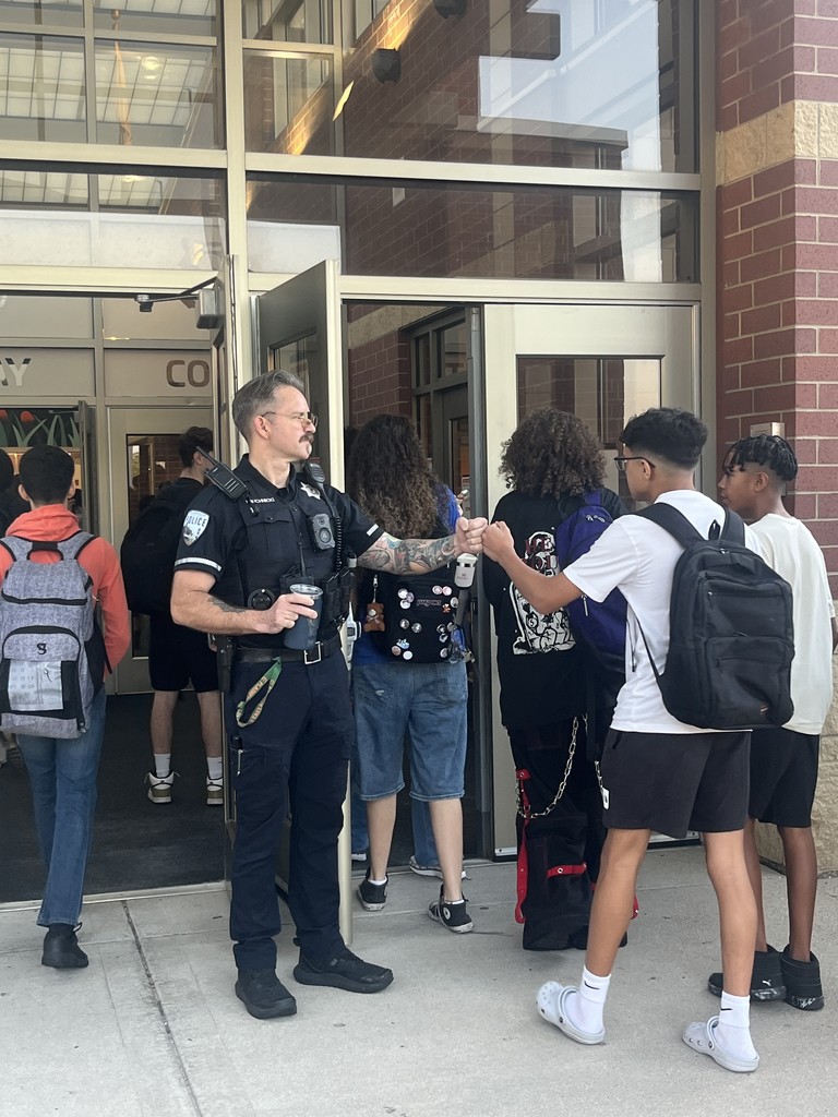 students walking into building
