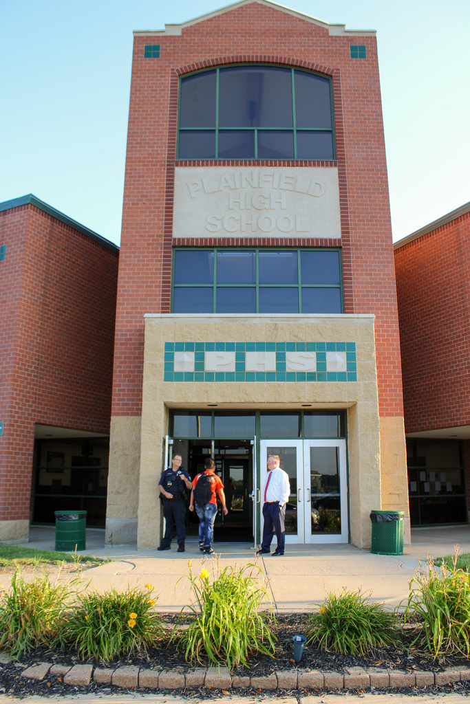 students enter Plainfield High School Central Campus on day one of school