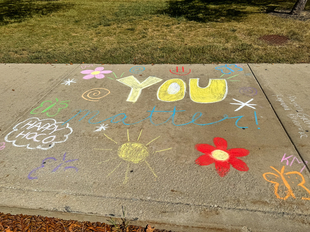 Sidewalk chalk You Matter with sunshine, flowers and butterfly