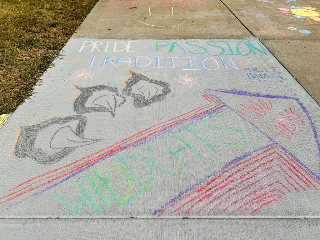 Pride passion tradition. Wildcats this way! Sidewalk chalk