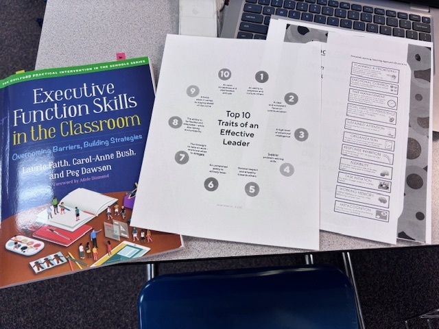 Executive Function Skills in the Classrom book and two workbook pieces of paper